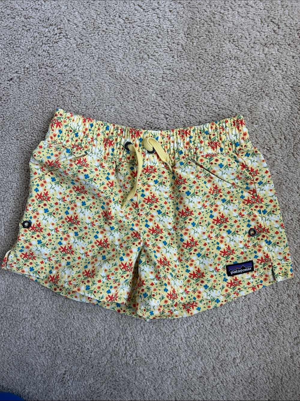 Patagonia Girls Yellow Floral Drawstring Baggie Shorts, S. (7-8)